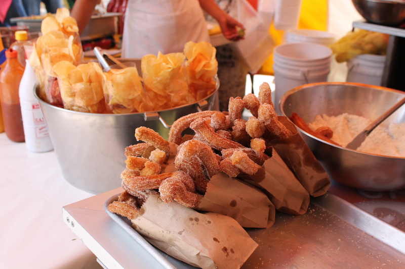 tasty, paper, close-up, spanish, fritter, sweet, retail, unhealthy eating, for sale, incidental people, food and drink, traditional, sweetened, street food