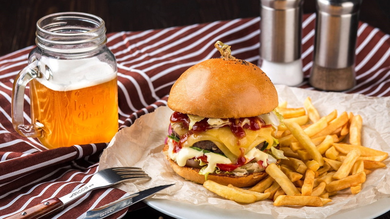 fried food, no people, ready-to-eat, burger, bun, take out food, meat, junk food, potato, refreshment, glass, snack, table, unhealthy eating, hamburger
