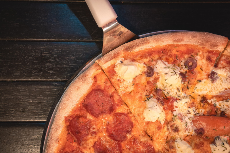 sausage, freshness, table, food photography, close-up, cheese, one person, photo, cooking, crust, body part, food, slice, pizza, 5K, food and drink, real people