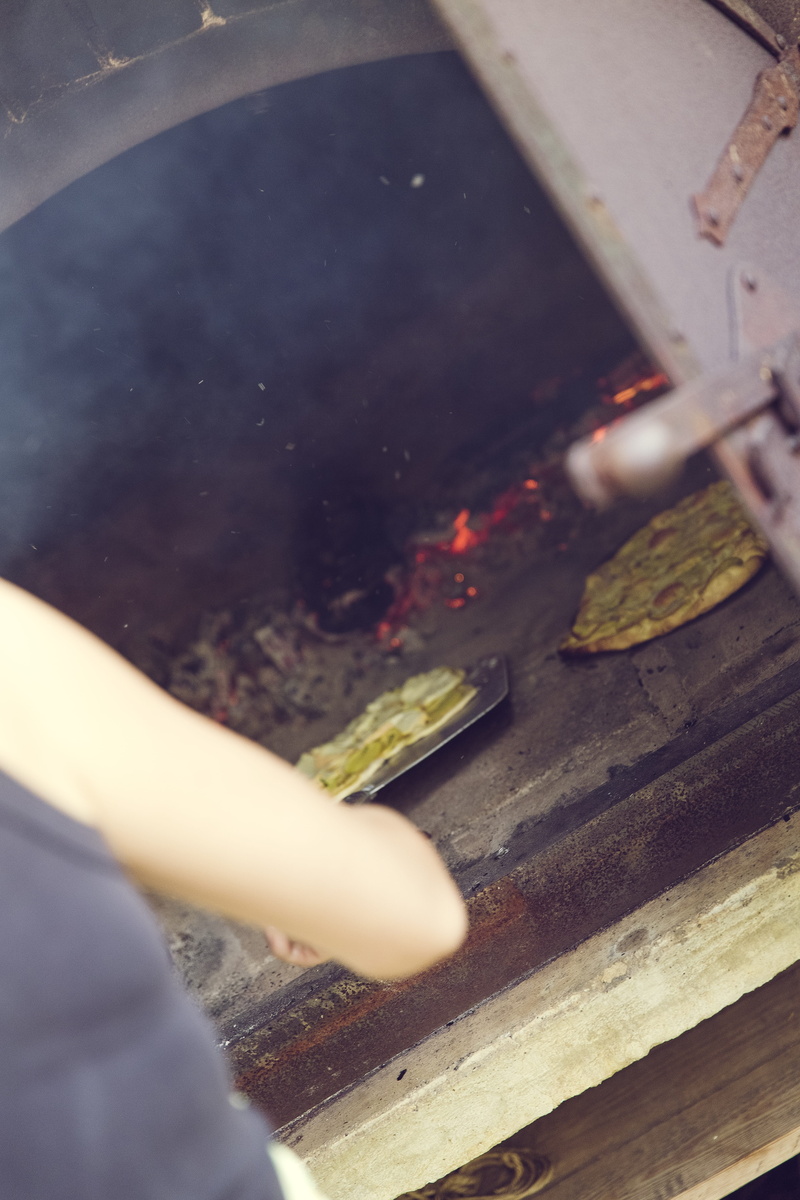 preparing food, pizzeria, Oven, human body part, pizza, fire - natural phenomenon, real people, wood - material, scalloped, freshness, one person, wood fired pizzas
