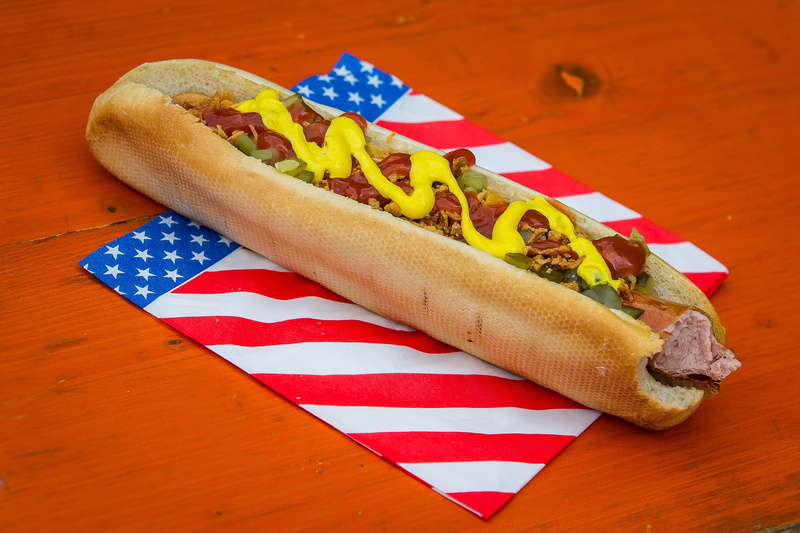 snack, sausage, freshness, no people, food, hotdog, bread, mustard, meat, indoors, relish, ready-to-eat, paper plate, close-up, nutrition, table, america