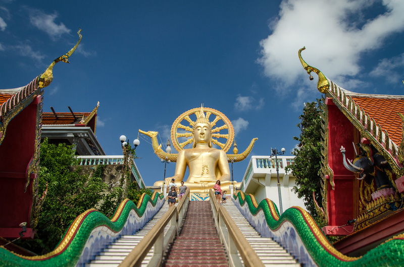 metropolis, big buddha temple, nature, handrail, tower, day, outdoors, belief, built structure, koh samui, shrine, city, sky, travel destinations, urban
