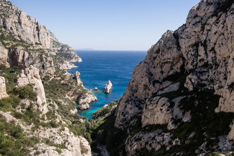 day, cliff, calanque de sugiton, mountain, horizon over water, clear sky, rock - object, sun, beauty in nature, horizon, calanque, water, sky, tranquility