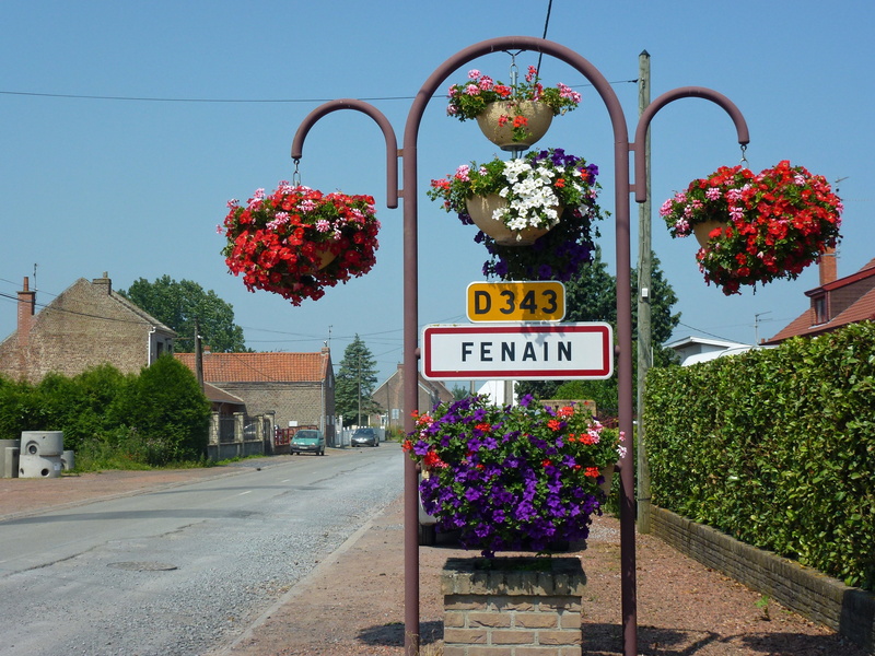 beauty in nature, day, town, plant, nature, road, western script, growth, flowering plant, cities, france, buildings, street, nord, building exterior, outdoors