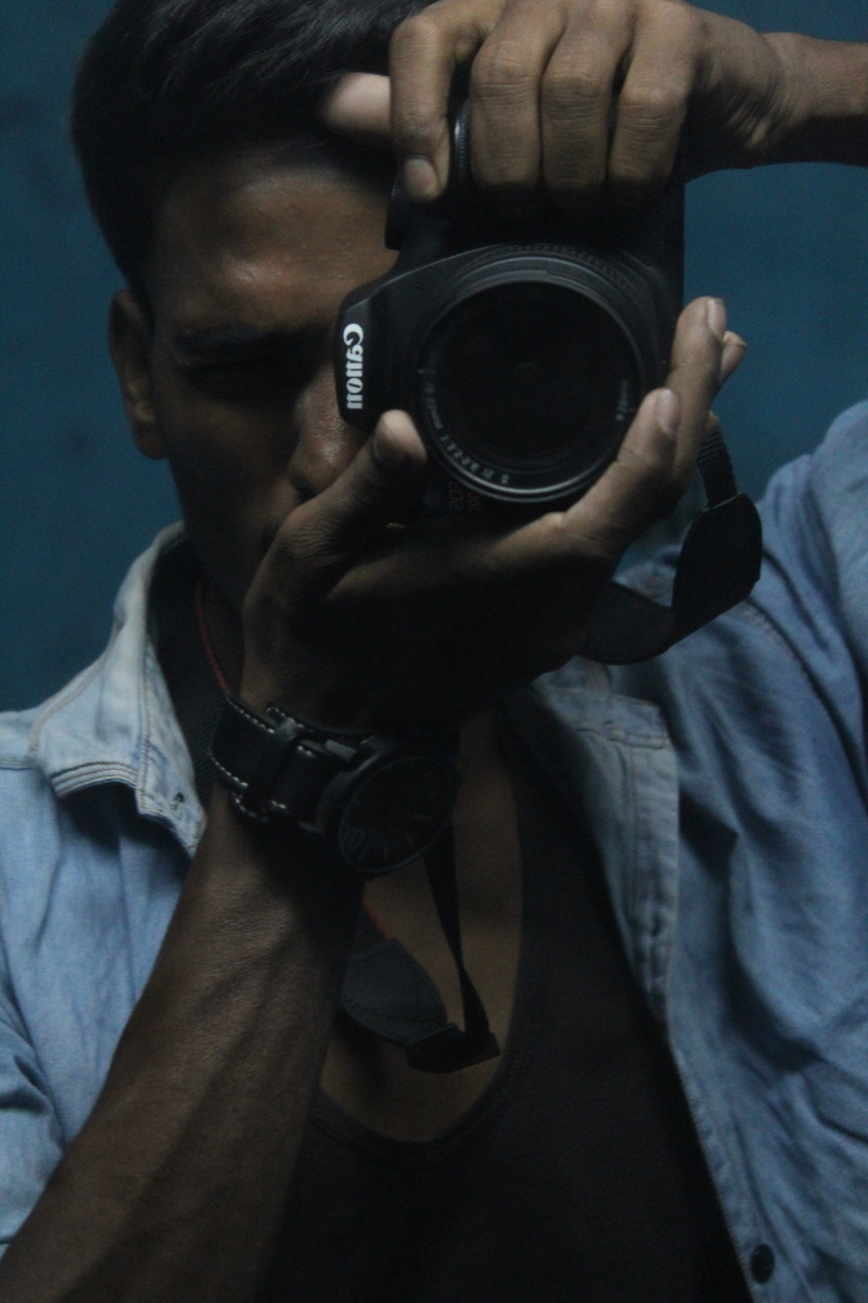 technology, photography themes, leisure activity, casual, digital camera, face, black, young adult, style, photographer, photographing, person, real people