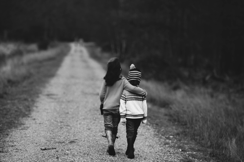 road, couple - relationship, women, outdoors, children, casual clothing, leisure activity, path, full length, two people, men, son, brother, togetherness