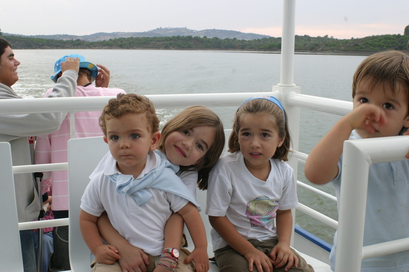 family, looking at camera, day, child, children, boat, boys, real people, females, 2K, people, game, males, portrait, lake, casual clothing, lifestyles