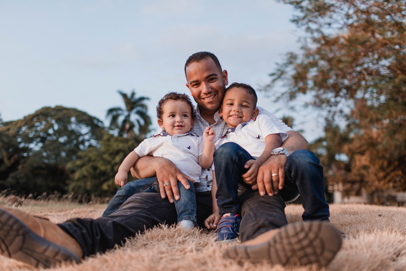 smiling, park, 5K, children, positive emotion, sitting, portrait, men, leisure, daddy, innocence, grass, group of people, offspring, embrace, males, together