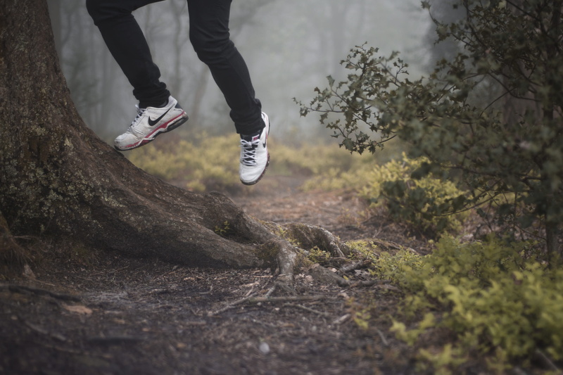 body part, outdoors, running shoe, autumn, 5K, footwear, nike, art, human limb, lifestyles, selective focus, leisure activity, human body part, one person