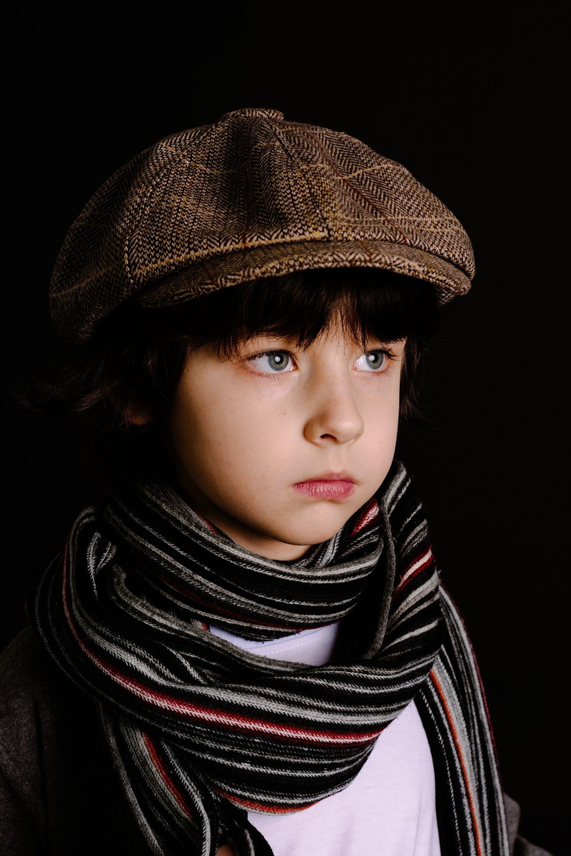 man, offspring, innocence, schoolboy, posing, children model, darkness, contemplation, fashion, clothing, minimalism, actor, studio shot, one, musician