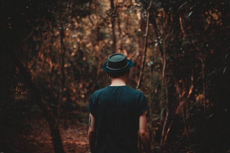 tattoo, leisure activity, land, rear view, 5K, woodland, outdoors, forest, dark, man, style, black, standing, towards, plant, walking, exploring, hat