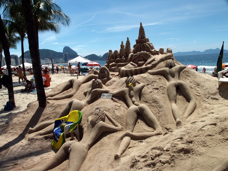 sky, travel destinations, nature, copa cabana, day, travel, beach, water, built structure, sand, cloud - sky, rio de janeiro, beach art, art and craft