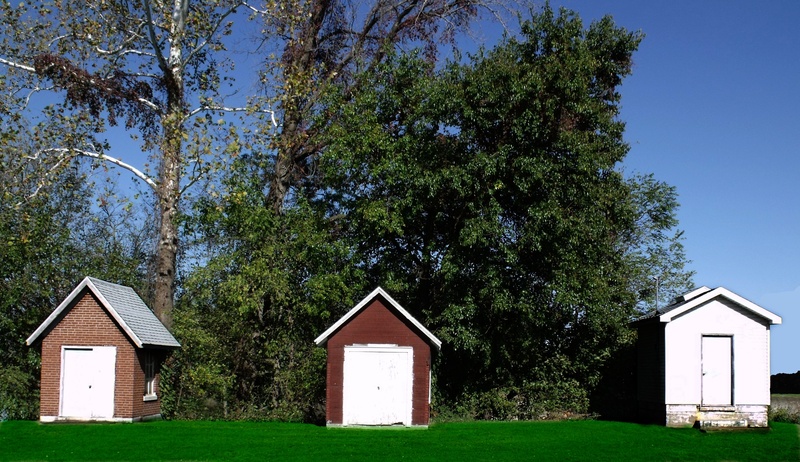 three, cabins, shacks, built structure, field, no people, sky, house, outdoors, plant, building, agricultural building, green color, tree, land, beauty in nature