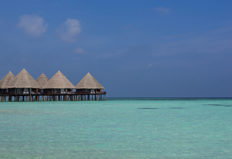 maldives, scenic, scenics - nature, swim, brown, building exterior, tourism, tranquil scene, horizon, waterfront, leisure, blue, roof, sand, cabanas, beach hut