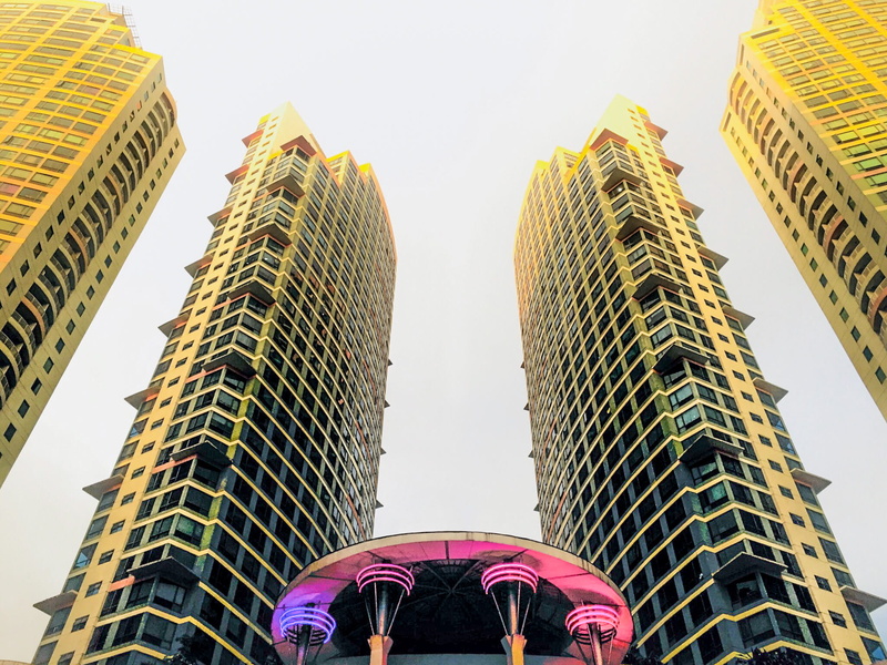 day, skyscraper, travel, building exterior, mall, symmetry, tower, low angle view, office, city, no people, philippines, built structure, outdoors, financial district