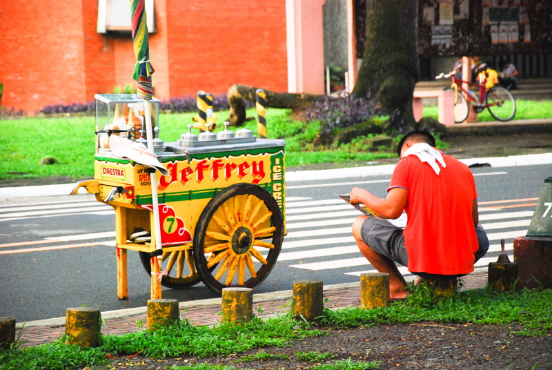 reading, young adult, transportation, adult, built structure, outdoors, leisure activity, philippines, university of the philippines diliman, day, real people
