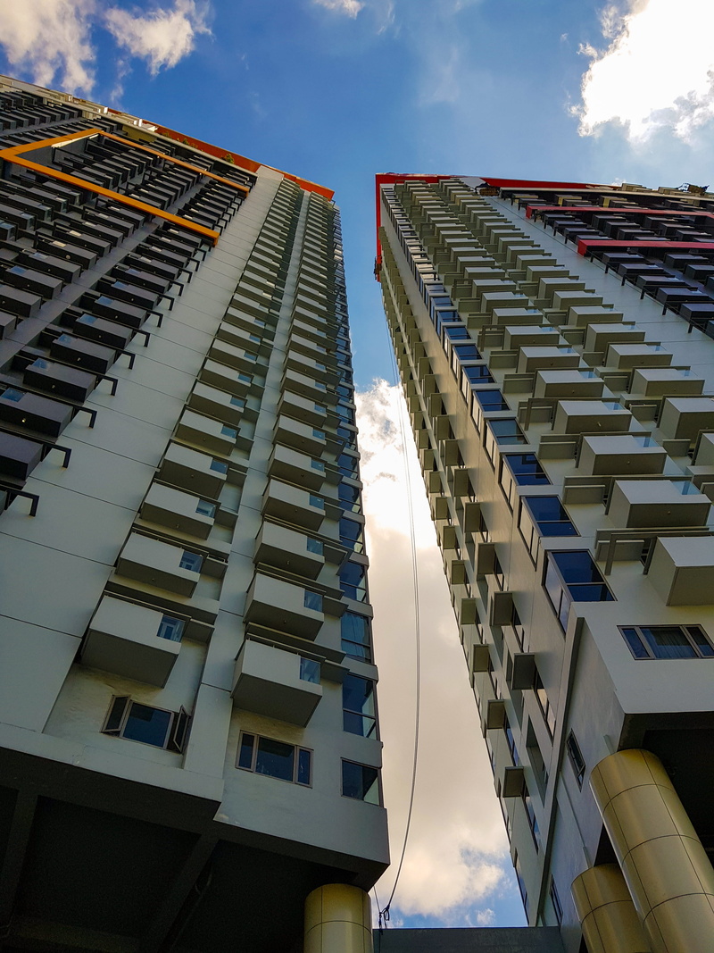 manhattan garden city in araneta center ( cubao ) quezon city, financial district, window, high rise, city life, cloud - sky, apartment, cloud, office building exterior