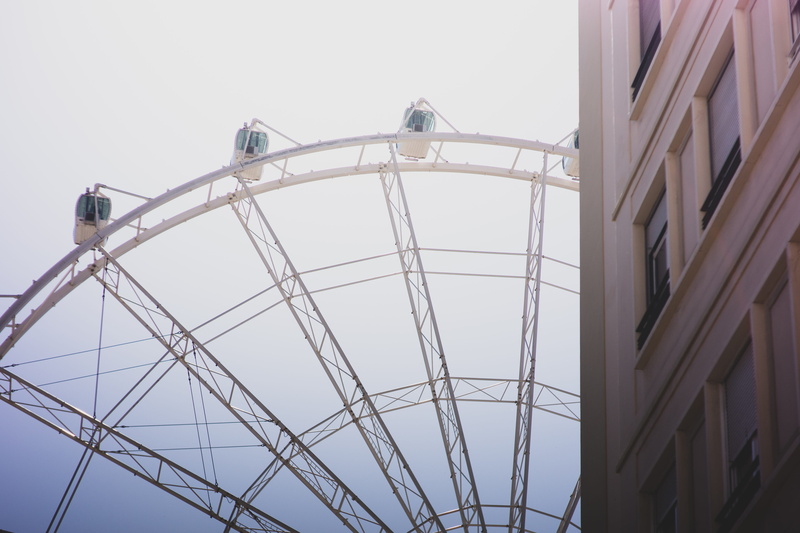 connection, metal, built structure, sun, clear sky, arts culture and entertainment, low angle view, network, amusement park ride, no people, day, skylight