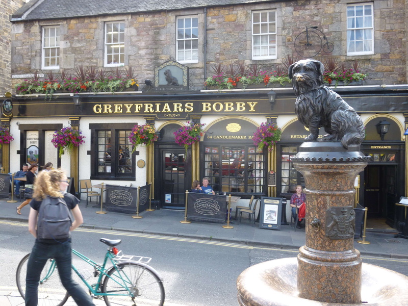 built structure, architecture, art and craft, incidental people, scottish, building exterior, statue, day, people, bobby, dog, creativity, mode of transportation