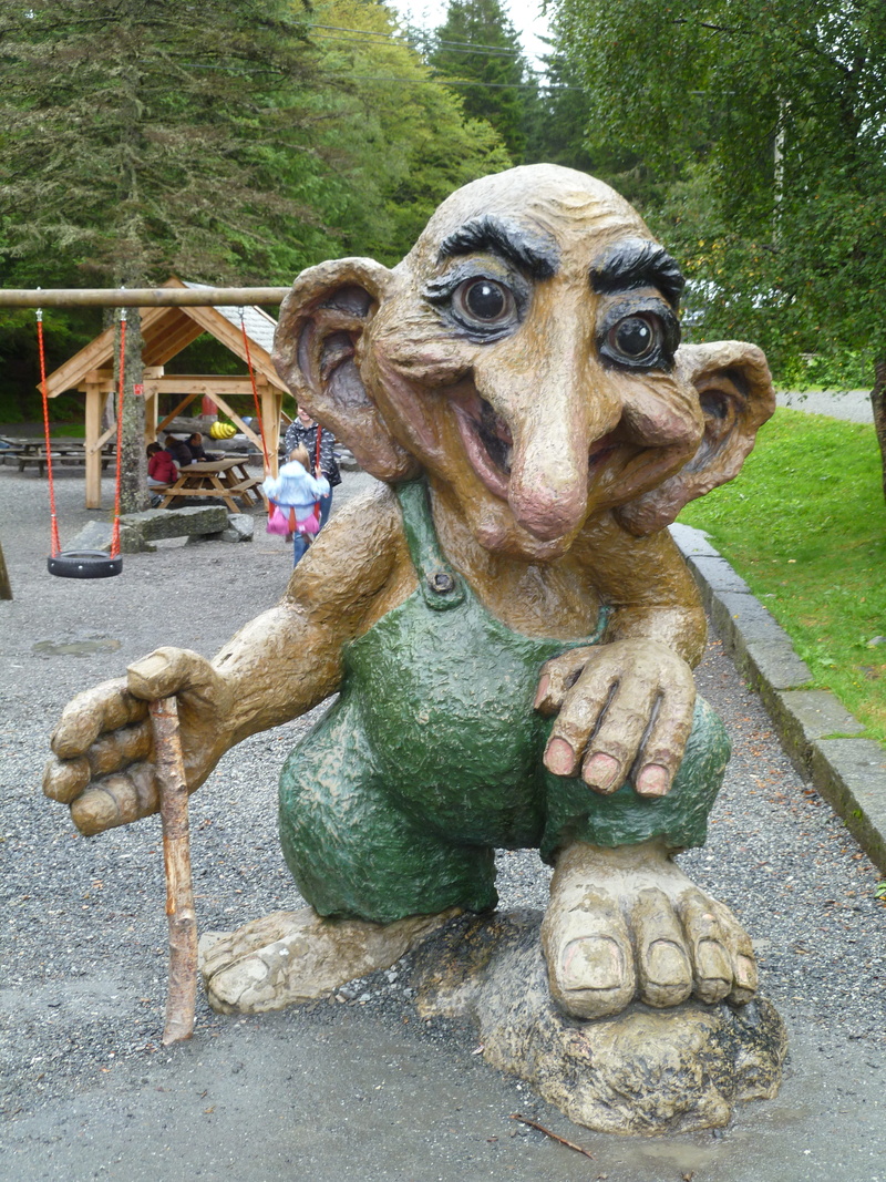 creativity, vacation, animal representation, public, domestic, art and craft, day, sculpture, holiday, dog, norwegian troll, domestic animals, craft, green