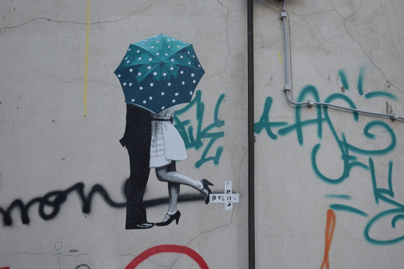 street art, sticker, wall - building feature, overcoat, outdoors, woman, 5K, built structure, man, umbrella, creativity, city, day, building exterior