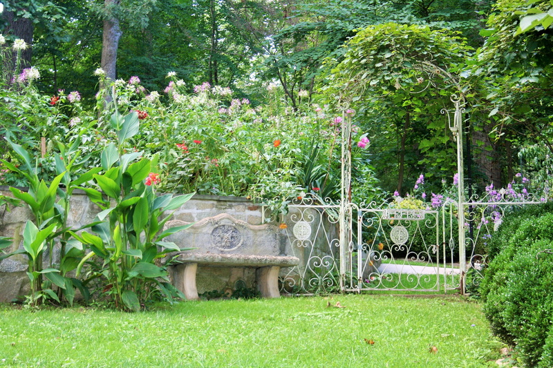 outdoors, gardening, no people, seat, flowerbed, Bench, park - man made space, garden bench, flower, tree, flowering plant, formal garden, park, growth