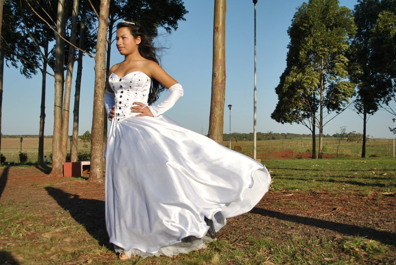 against the wind, long dress, young Adult, adult, married, land, tree, person, white, walking, leisure activity, brunette, beauty, day, black hair, satin