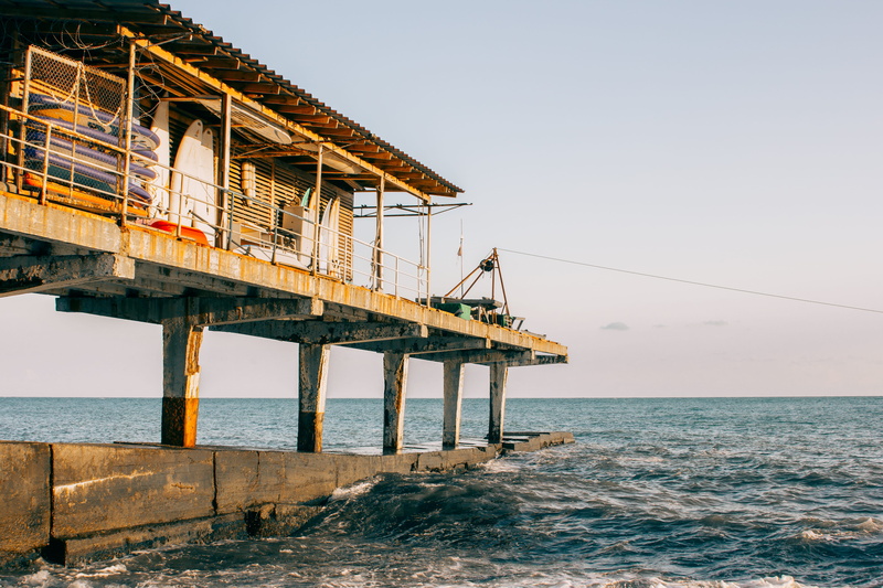 outdoors, sea, horizon over water, building, pollars, brown, idyllic, scenics - nature, russia, pier, water, ocean, clear sky, 4K, nature, built structure