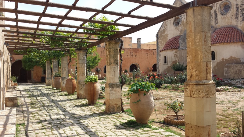 potted plant, no people, brown, flower pot, nature, house, city, architectural column, patch, pergola, courtyard, plants, architecture, crete, alley, built structure