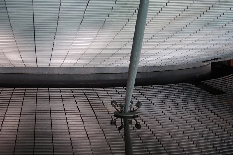 day, banister, machine, no people, pattern, wall - building feature, architecture, oars, hangar, spoke, electrical device, column, appliance, handrail