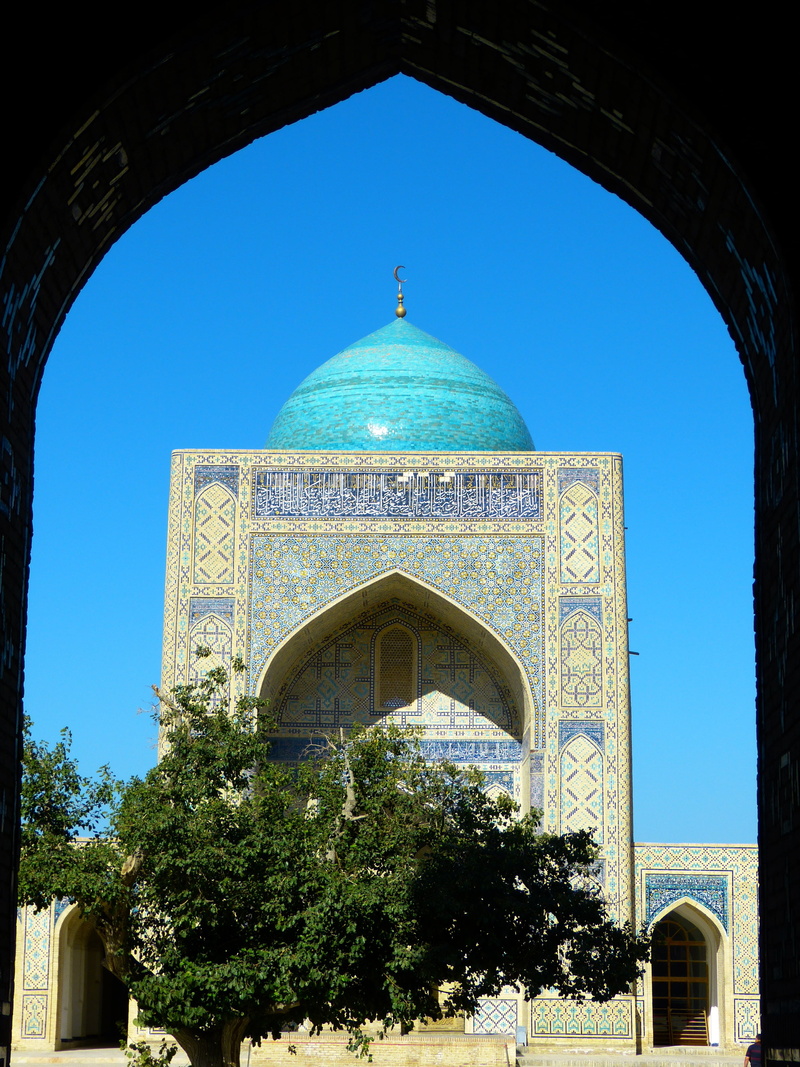 courtyard, building exterior, plant, mosque, sky, built structure, tree, no people, place of worship, mosaic, spirituality, clear sky, kalon mosque islam