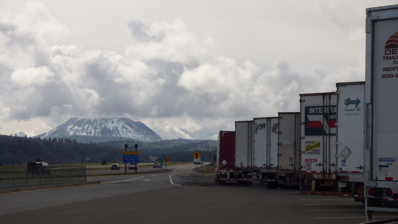 land vehicle, mount shasta, no people, sky, travel, smoke - physical structure, architecture, snowcapped mountain, trucks, truck, beauty in nature, direction