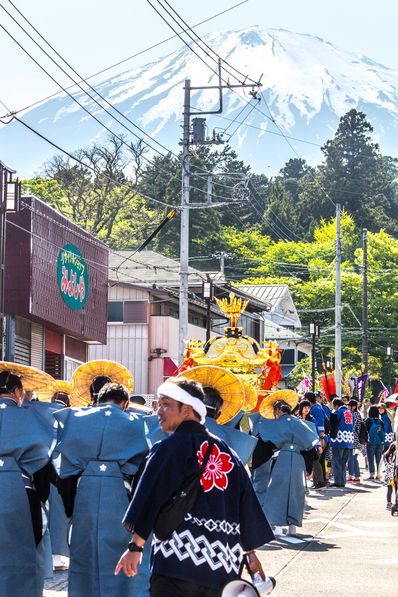 outdoors, tree, musician, architecture, costume, military uniform, fuji festival, musical instrument, marching, nature, plant, travel, real people, street