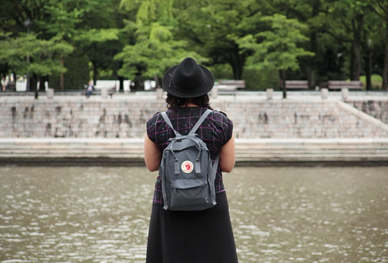 clothing, security, african-american, river, canal, curly hair, backpack, hiroshima prefecture, law, nature, water, japan, real people, uniform, girl looking away