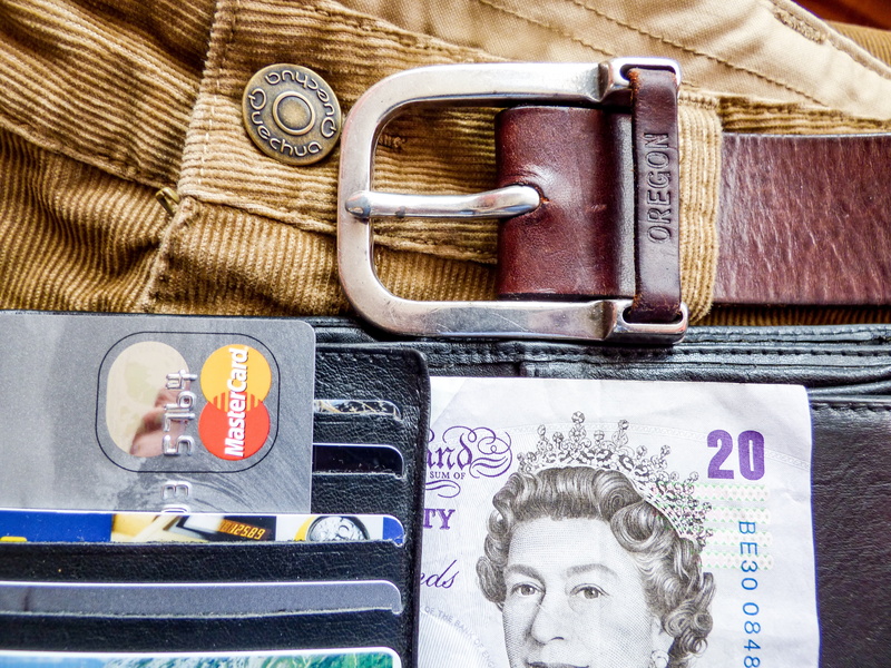 indoors, manly, technology, pants, currency, close-up, paper currency, business, banknote, choice, directly above, people, finance, still life, travel