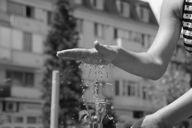 built structure, splash, flowing water, shower, one person, arm, bubbler, human limb, wet, motion, 4K, day, finger, human body part, tapping, water post