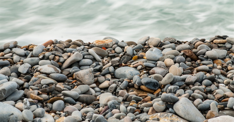 pebble, beauty in nature, gray, sea shore, animal wildlife, water, brown, sea wave, depth, cyan, stone, nature, stone - Object, wave, pebbles, solid, depth of field