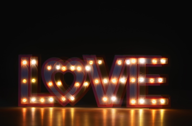 lighting equipment, single word, communication, colors, capital letter, signage, architecture, marquee, indoors, lights, western script, no people, bright