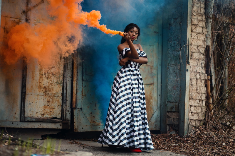 young women, woman, smoke, portrait, gate, casual clothing, beautiful girl, 5K, outdoors, adult, outdoor, hairstyle, clothing, wear, flame, blue, earrings