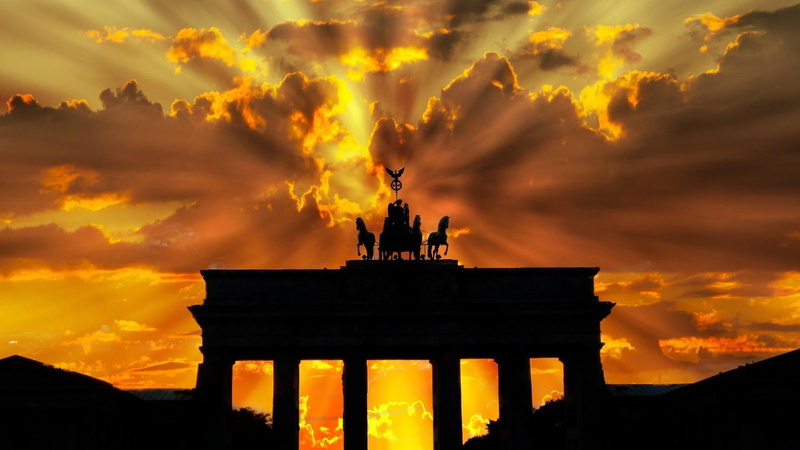 building, no people, europe, history, tourism, orange color, sunset, sunlight, berlin, afterglow, evening, architectural column, sun, cloud - sky, sky