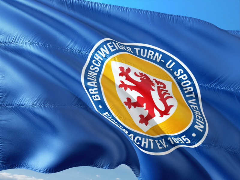 pattern, badge, eintracht braunschweig, colored background, 4K, football, bundesliga, text, flag, western script, close-up, indoors, competition, communication