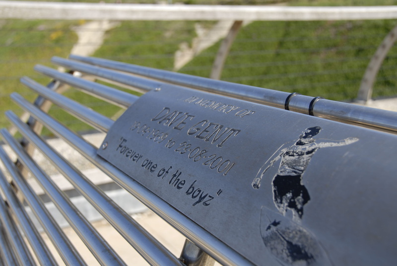 label, metal, banister, military, number, communication, person, handrail, outdoors, awning, architecture, high angle view, history, railing, canopy, human