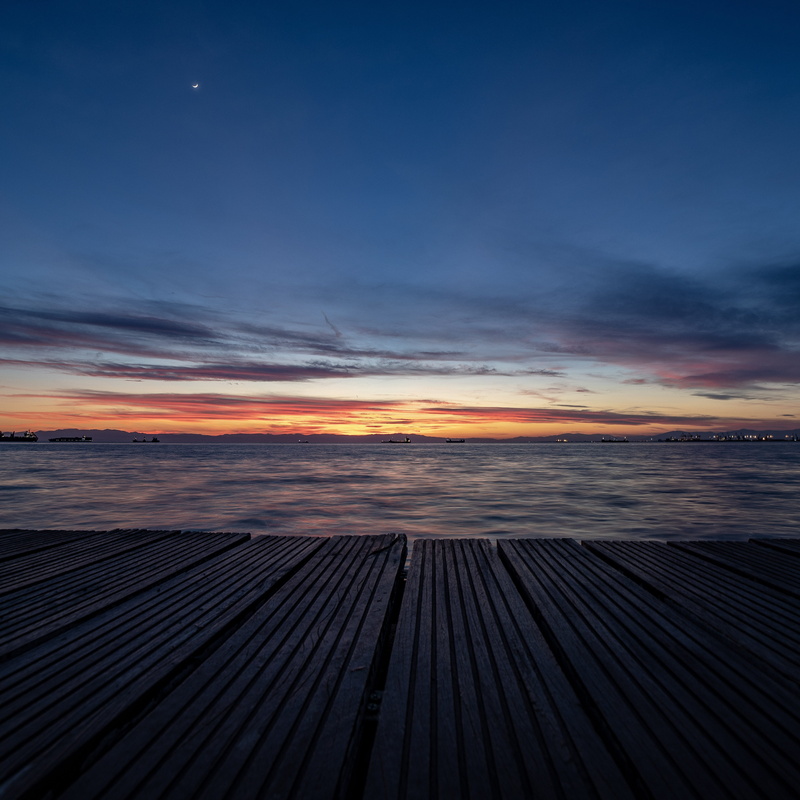 electrical device, night, dramatic sky, outdoors, boardwalk, porch, deck, waterfront, scenics - nature, nostalgia, no people, water, solar panels, red sky