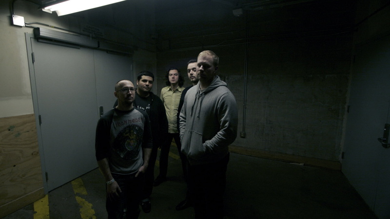 s, gray, three quarter length, indoors, glasses, band, group of people, government, narrows, pullover, standing, light, males, people, young adult, coworker