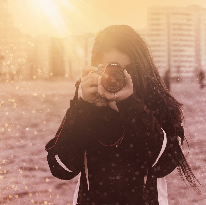 city, photography themes, women, sun, colors, lifestyles, warm clothing, color, cute, lights, holding, canon, beauty, love, architecture, photographic equipment