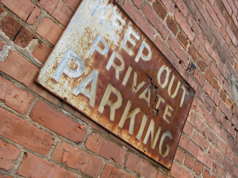 rust, no people, brick, western script, brown, wall - building feature, architecture, metal, full frame, old, sign, text, communication, low angle view