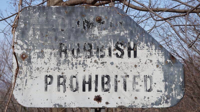 white, text, weathered, communication, winter, non-western script, damaged, nature, sign, script, close-up, outdoors, architecture, capital letter, day