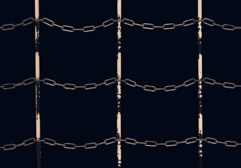 chain, black background, studio shot, indoors, protection, grid, exclusion, boundary, iron - metal, safety, fence, security, focus on foreground, restricted