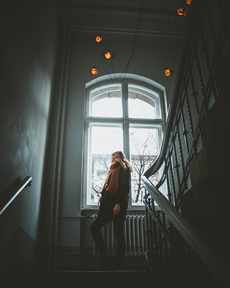 casual clothing, contemplation, indoors, hairstyle, architecture, climbing, 4K, full length, steps and staircases, young women, adult, portrait, lifestyles