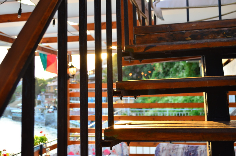 window, evening, architecture, wood - material, railing, building, light, day, focus on foreground, religion, sunlight, upstairs, stairs, spirituality